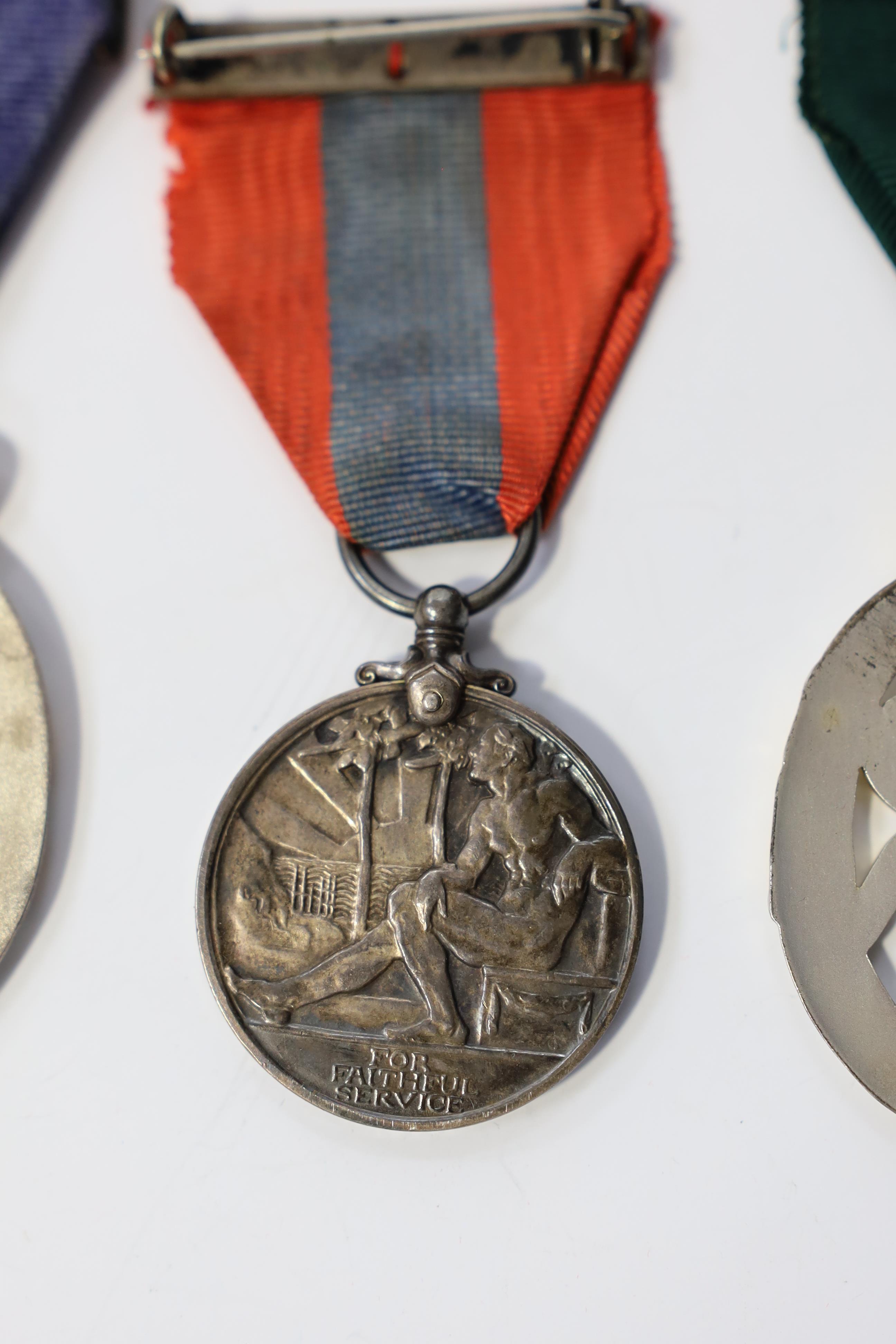 Three assorted service medals; Imperial Service medal to Henry Chillingworth; Territorial Efficiency Decoration 1964; T&A.V.R Efficiency Decoration 1970. All cased. Condition - good.